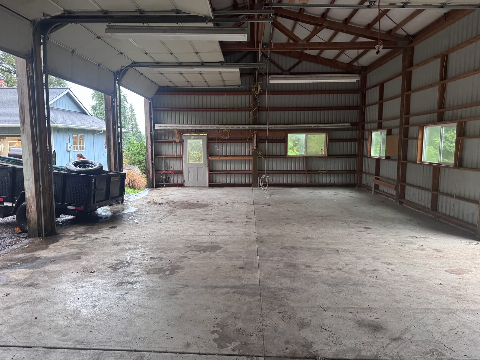 Emptied pole barn shop after a full cleanout by High Desert Hauling