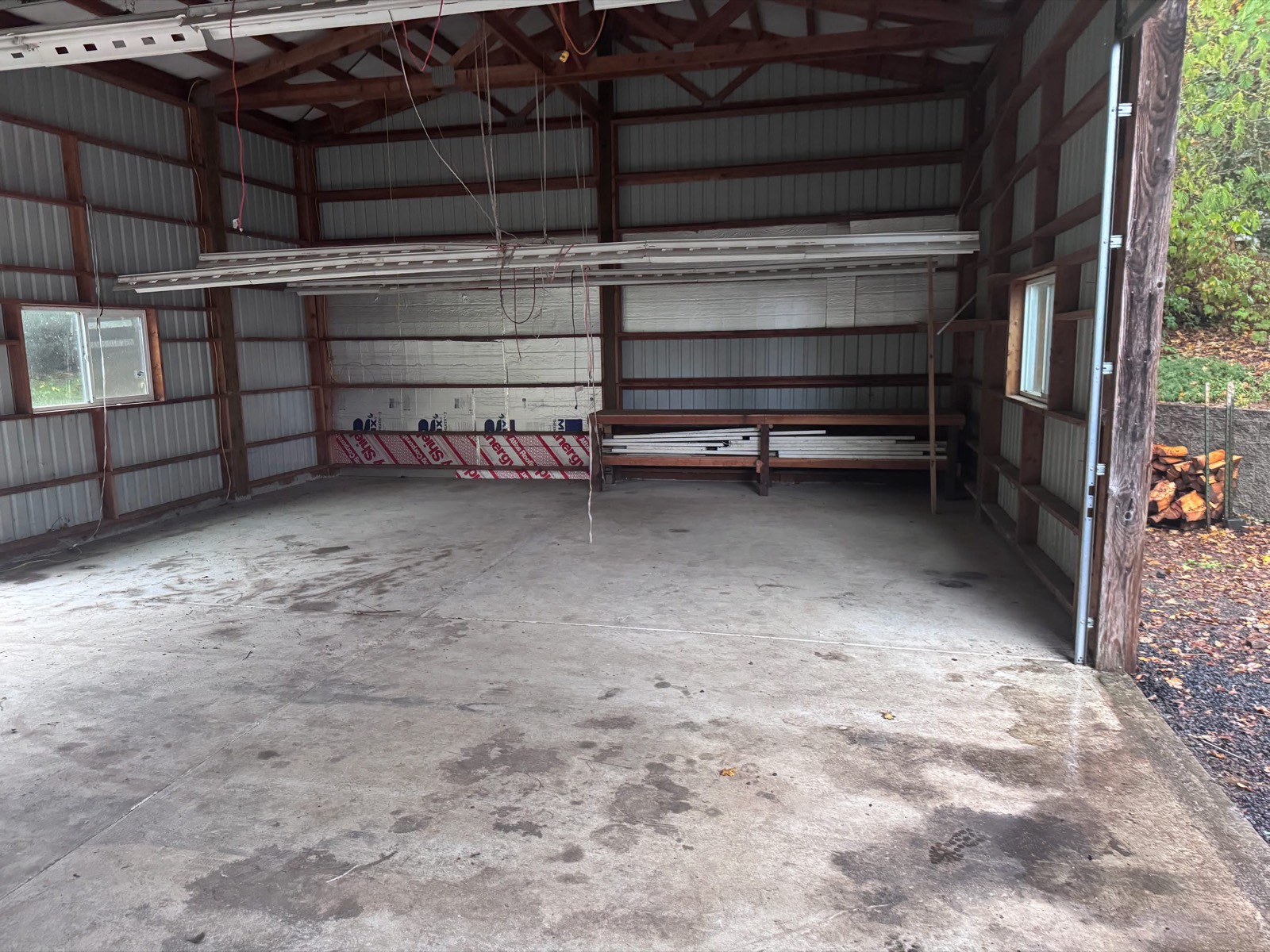 Large pole barn shop cleared out and swept clean by High Desert Hauling